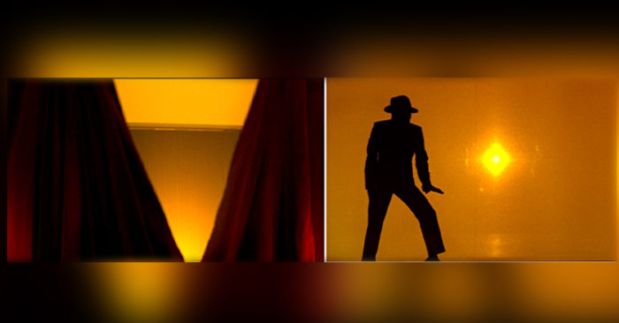 Jackson symbol sunrise: You Rock my World 2001 picture montage: red curtain, behind is a golden spotlight. picture two: Jackson in the golden spotlight on stage. www.partofhystory.de